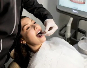 Dentist fitting a clear align